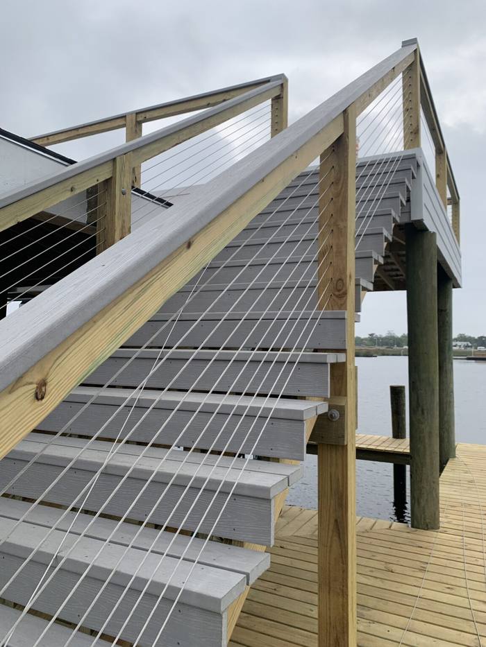 Stairs and cable rails leading to the party deck
